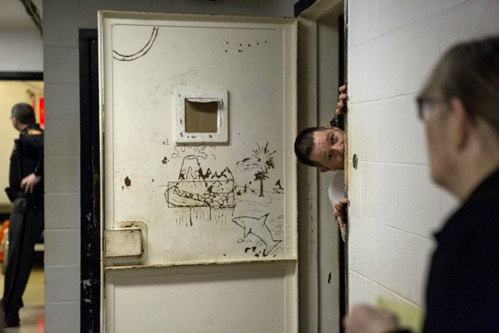Best of Show - Jessica Phelps / Newark Advocate, “Life Locked Up in the County Jail”An inmate, working as a trustee playfully pokes his head out from his 4 man cell in January, 2020. The trustees at the jail can earn time off of their sentence by helping the guards with daily tasks like mopping or helping prepare meals. 